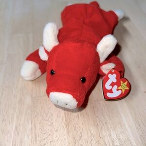 Ty Beanie Baby “Snort.” Perfect condition, stored in plastic.
